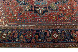 Corner detail of 1930s Heriz rug showing border pattern and Wool pile