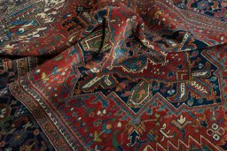 Surface texture of 1930s Heriz rug with natural Wool and intricate pattern