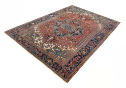 Corner detail of 1930s Heriz rug showing border pattern and Wool pile