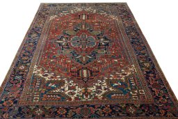 Surface texture of 1930s Heriz rug with natural Wool and intricate pattern