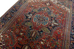 Backside of handmade 1930s Heriz rug showing knot structure and weave density
