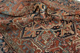 Surface texture of 1930s Heriz rug with natural Wool and intricate pattern
