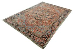 Corner detail of 1930s Heriz rug showing border pattern and Wool pile