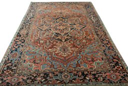 Surface texture of 1930s Heriz rug with natural Wool and intricate pattern