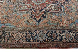 Corner detail of 1930s Heriz rug showing border pattern and Wool pile