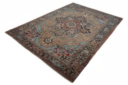 Corner detail of 1930s Heriz rug showing border pattern and Wool pile