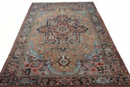 Surface texture of 1930s Heriz rug with natural Wool and intricate pattern
