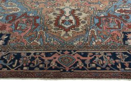 Full view of 1930s Heriz rug from Iran / Persia, 344 × 240 cm in Red tones