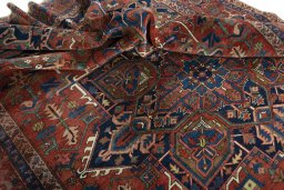 Surface texture of 1930s Heriz rug with natural Wool and intricate pattern
