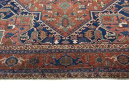 Full view of 1930s Heriz rug from Iran / Persia, 486 × 327 cm in Red tones