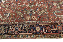 Corner detail of 1930s Heriz rug showing border pattern and Wool pile