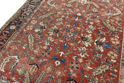 Backside of handmade 1930s Heriz rug showing knot structure and weave density