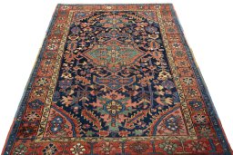 Surface texture of 1930s Heriz rug with natural Wool and intricate pattern