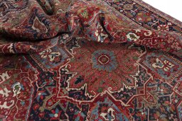 Surface texture of 1930s Heriz rug with natural Wool and intricate pattern