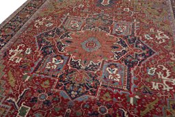 Backside of handmade 1930s Heriz rug showing knot structure and weave density