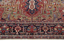 Full view of 1930s Heriz rug from Iran / Persia, 412 × 310 cm in Red tones