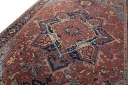 Backside of handmade 1930s Heriz rug showing knot structure and weave density