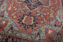 Close-up detail of 1930s Heriz rug from Iran / Persia showing Wool weave