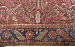 Corner detail of 1930s Heriz rug showing border pattern and Wool pile
