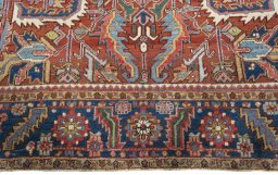 Full view of 1930s Heriz rug from Iran / Persia, 314 × 225 cm in Red tones