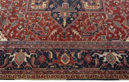 Corner detail of 1930s Heriz rug showing border pattern and Wool pile