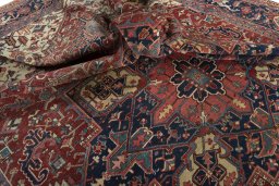 Surface texture of 1930s Heriz rug with natural Wool and intricate pattern