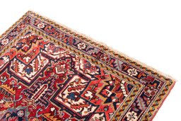 Surface texture of 1985s Heriz rug with natural Wool and intricate pattern