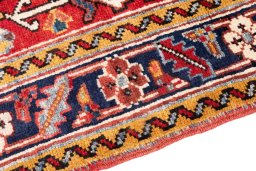 Backside of handmade 1985s Heriz rug showing knot structure and weave density