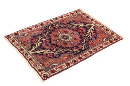 Corner detail of 1920s Heriz rug showing border pattern and Wool pile