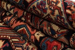 Surface texture of 1990s Heriz rug with natural Wool and intricate pattern