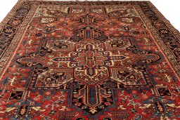 Full view of 1990s Heriz rug from Iran / Persia, 340 × 255 cm in Red tones