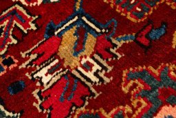 Backside of handmade 2005s Heriz rug showing knot structure and weave density