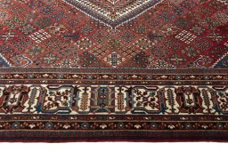 Corner detail of 1970s Joshagan rug showing border pattern and Wool pile
