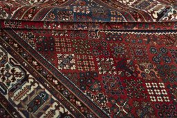 Close-up detail of 1970s Joshagan rug from Iran / Persia showing Wool weave