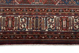 Full view of 1970s Joshagan rug from Iran / Persia, 324 × 224 cm in Red tones