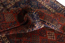 Surface texture of 1970s Joshagan rug with natural Wool and intricate pattern