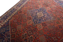 Backside of handmade 1970s Joshagan rug showing knot structure and weave density