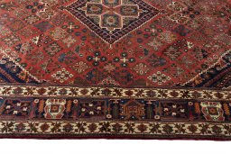 Corner detail of 2000s Joshagan rug showing border pattern and Wool pile
