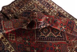 Surface texture of 2000s Joshagan rug with natural Wool and intricate pattern