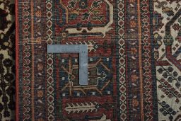 Close-up detail of 1950s Joshagan rug from Iran / Persia showing Wool weave