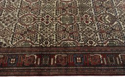 Close-up detail of 1950s Joshagan rug from Iran / Persia showing Wool weave