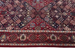 Corner detail of 2000s Joshagan rug showing border pattern and Wool pile