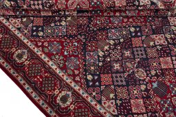 Close-up detail of 2000s Joshagan rug from Iran / Persia showing Wool weave