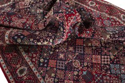 Surface texture of 2000s Joshagan rug with natural Wool and intricate pattern