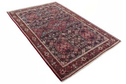 Close-up detail of 2000s Joshagan rug from Iran / Persia showing Wool weave