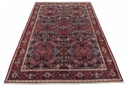 Surface texture of 2000s Joshagan rug with natural Wool and intricate pattern