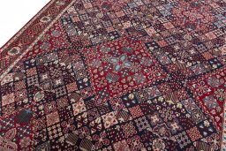 Backside of handmade 2000s Joshagan rug showing knot structure and weave density