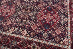 Close-up detail of 2000s Joshagan rug from Iran / Persia showing Wool weave