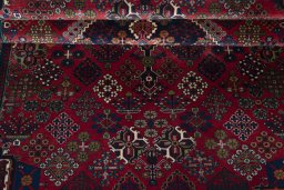Close-up detail of 1970s Joshagan rug from Iran / Persia showing Wool weave