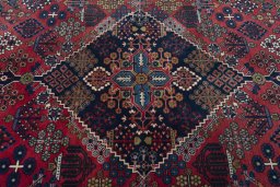 Central medallion detail of 1970s Joshagan rug from Iran / Persia